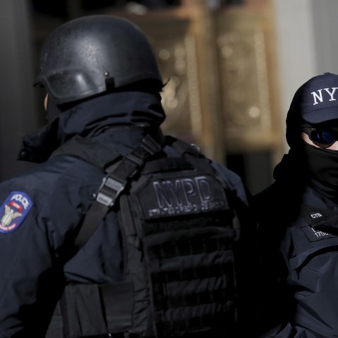 New York City Police officers (NYPD) work in Times Square in the Manhattan borough of New York, Jan. 20, 2016. (Photo by Brendan McDermid/Reuters)