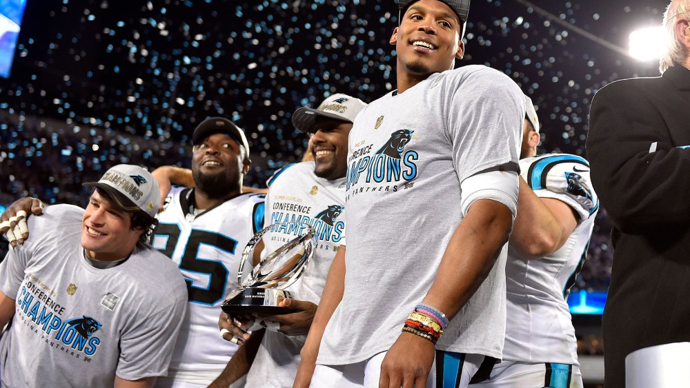 Carolina Panthers quarterback Cam Newton, right, celebrates after beating the Arizona Cardinals in the NFC Championship football game at Bank of America Stadium on Jan 24, 2016 in Charlotte, N.C. (Photo by Bob Donnan/USA Today Sports/Reuters)