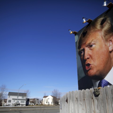 A large poster of Republican presidential candidate Donald Trump is displayed in a residential neighborhood in West Des Moines, Iowa, Jan. 28, 2016. (Photo by Brian Snyder/Reuters)