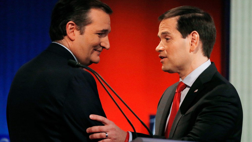 Republican presidential candidates and Senators Ted Cruz and Marco Rubio shake hands at the end of the debate held by Fox News in Des Moines, Iowa, Jan. 28, 2015. (Photo by Carlos Barria/Reuters)