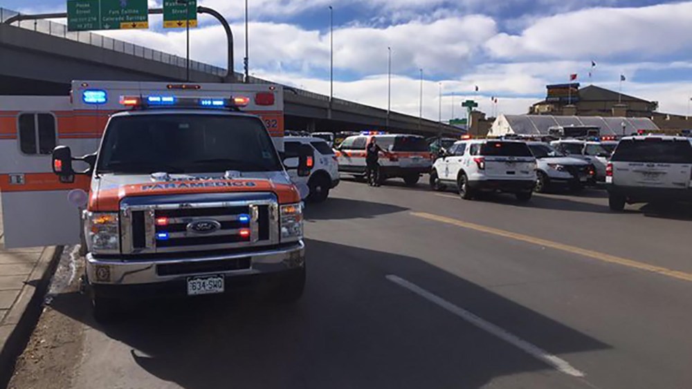 Emergency and police vehicles are seen outside the Denver Coliseum in this picture released by the Denver Police Department, in Denver, Colo., Jan. 30, 2016. (Photo by Denver Police Department/Handout/Reuters)