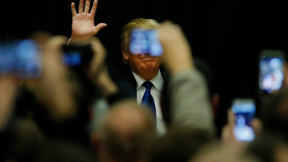 Republican presidential candidate Donald Trump speaks at a campaign event at Clinton Middle School in Clinton, Iowa, Jan., 30, 2015. (Photo by Carlos Barria/Reuters)