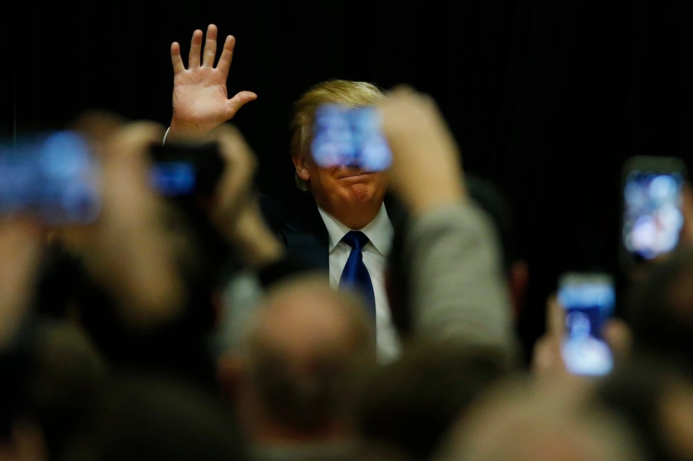 Republican presidential candidate Donald Trump speaks at a campaign event at Clinton Middle School in Clinton, Iowa, Jan., 30, 2015. (Photo by Carlos Barria/Reuters)