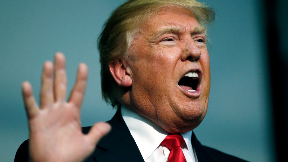 Republican Presidential candidate Donald Trump speaks during the Iowa caucuses at the Seven Flags Event Center in Clive, Iowa on Feb. 1, 2016. (Photo by Jim Bourg/Reuters)