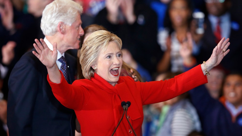 Democratic presidential candidate Hillary Clinton celebrates at her caucus night rally in Des Moines, Iowa Feb. 1, 2016. (Photo by Adrees Latif/Reuters)