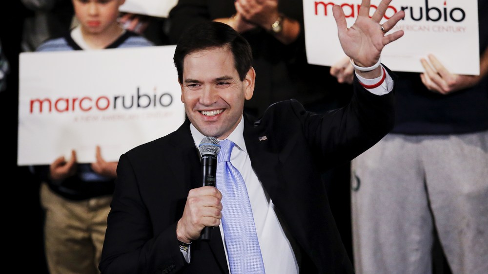 Senator and Republican presidential candidate Marco Rubio waves as he arrives at a campaign rally in Exeter, N.H., Feb. 2, 2016. (Photo by Carlo Allegri/Reuters)