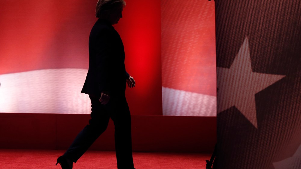 Hillary Clinton walks offstage during a break after a fiery exchange with rival candidate Bernie Sanders during the MSNBC Democratic debate in Durham, N.H., Feb. 4, 2016. (Photo by Mike Segar/Reuters)