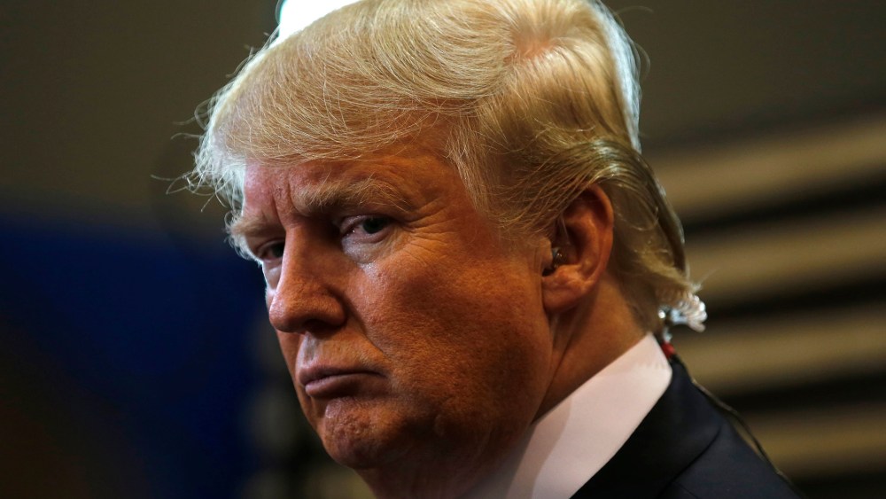 Republican presidential candidate Donald Trump talks to the media in the "spin room" after the Republican presidential candidates debate sponsored by ABC News at Saint Anselm College in Manchester, N.H., Feb. 6, 2016. (Photo by Carlo Allegri/Reuters)