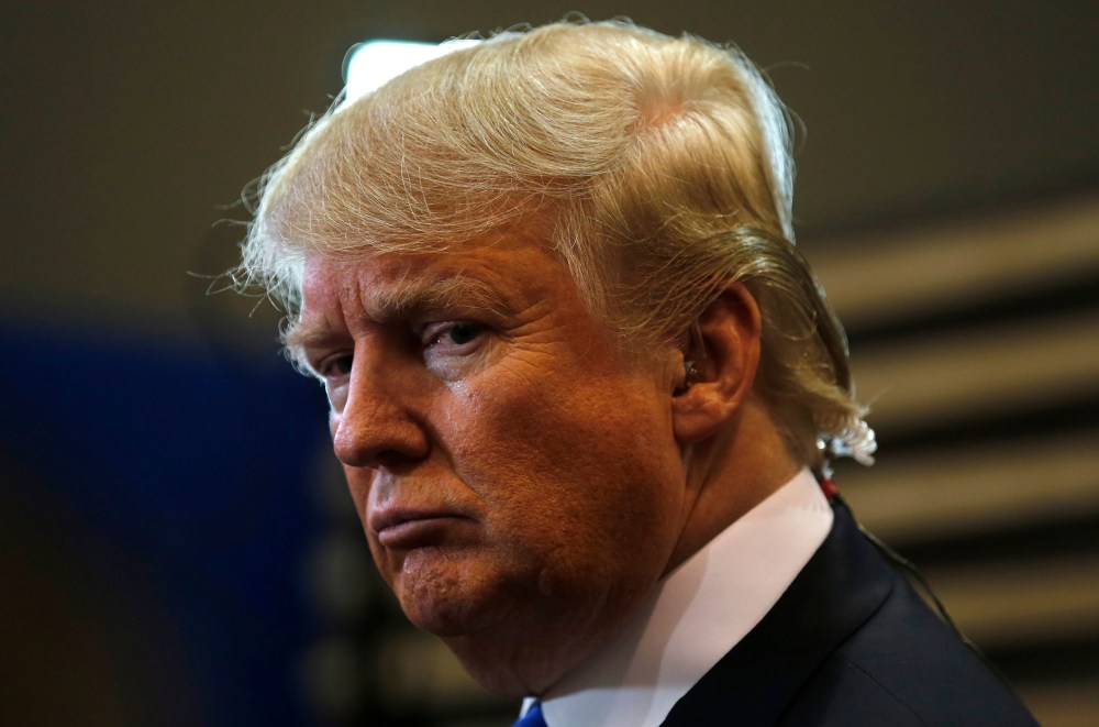 Republican presidential candidate Donald Trump talks to the media in the "spin room" after the Republican presidential candidates debate sponsored by ABC News at Saint Anselm College in Manchester, N.H., Feb. 6, 2016. (Photo by Carlo Allegri/Reuters)