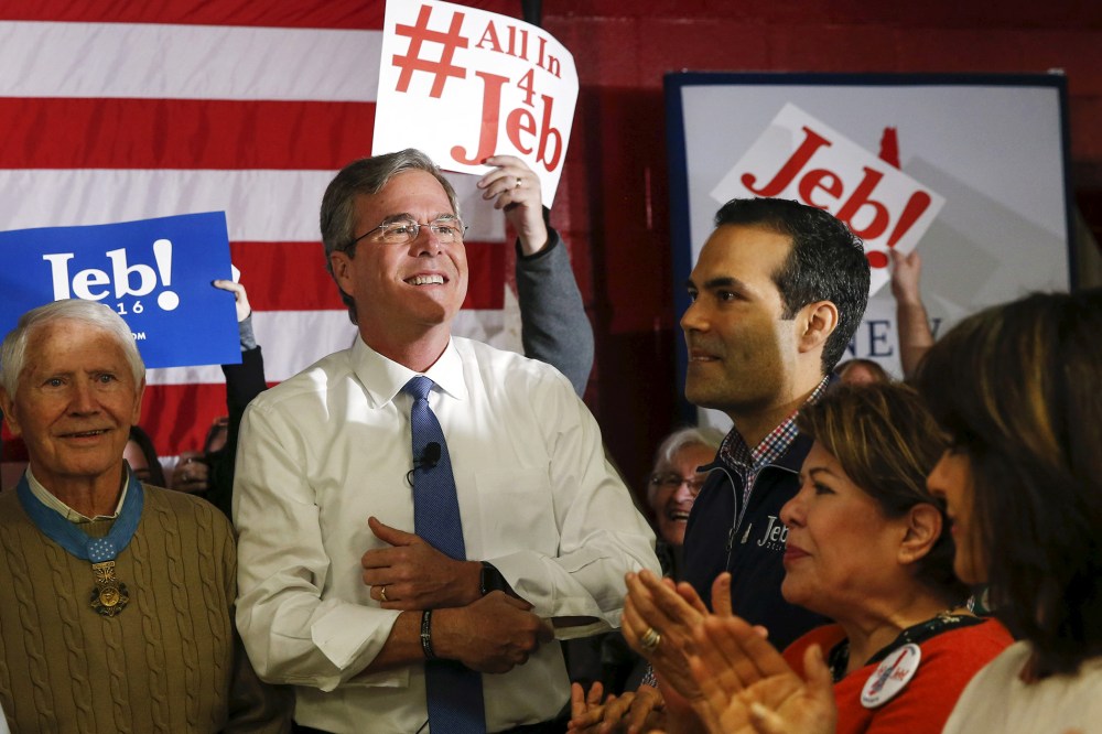 Republican U.S. presidential candidate Jeb Bush stands near his son George P. Bush and wife Columba before addressing a town hall during a campaign stop at Woodbury School in Salem, N.H., Feb. 7, 2016. (Photo by Adrees Latif/Reuters)