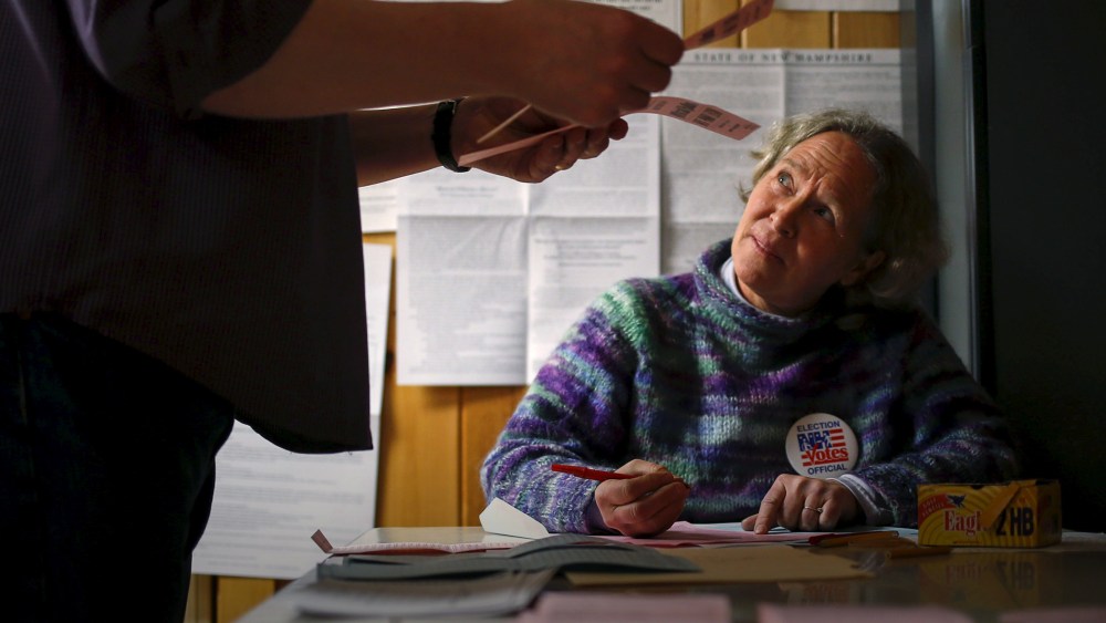 Officials count ballots in New Hampshire's first-in-the-nation primary at the town hall in Hart's Location, New Hampshire, Feb. 9, 2016. (Photo by Adrees Latif/Reuters)
