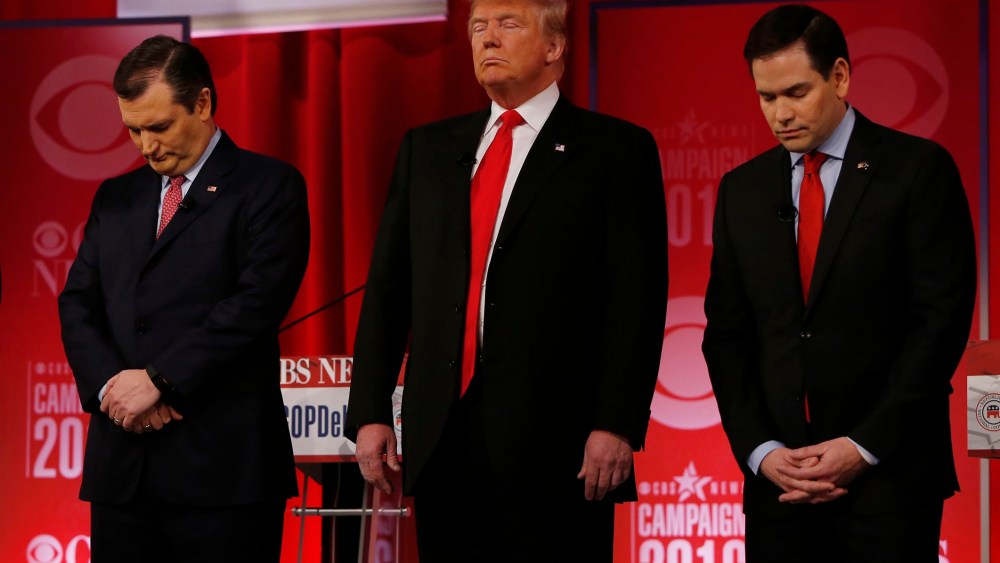 Republican presidential candidates Sen. Ted Cruz, Donald Trump and Sen. Marco Rubio pause in honor of Supreme Court Associate Justice Antonin Scalia before the start of the Republican presidential debate, Feb. 13, 2016. (Photo by Jonathan Ernst/Reuters)