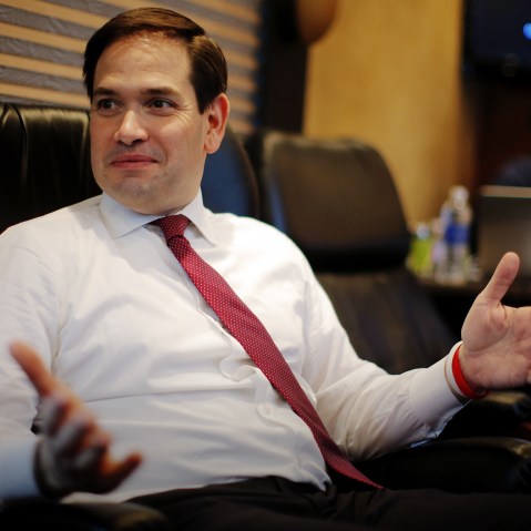 Republican presidential candidate Marco Rubio speaks with members of the media on his campaign bus between stops in S.C., Feb. 15, 2016. (Photo by Chris Keane/Reuters)