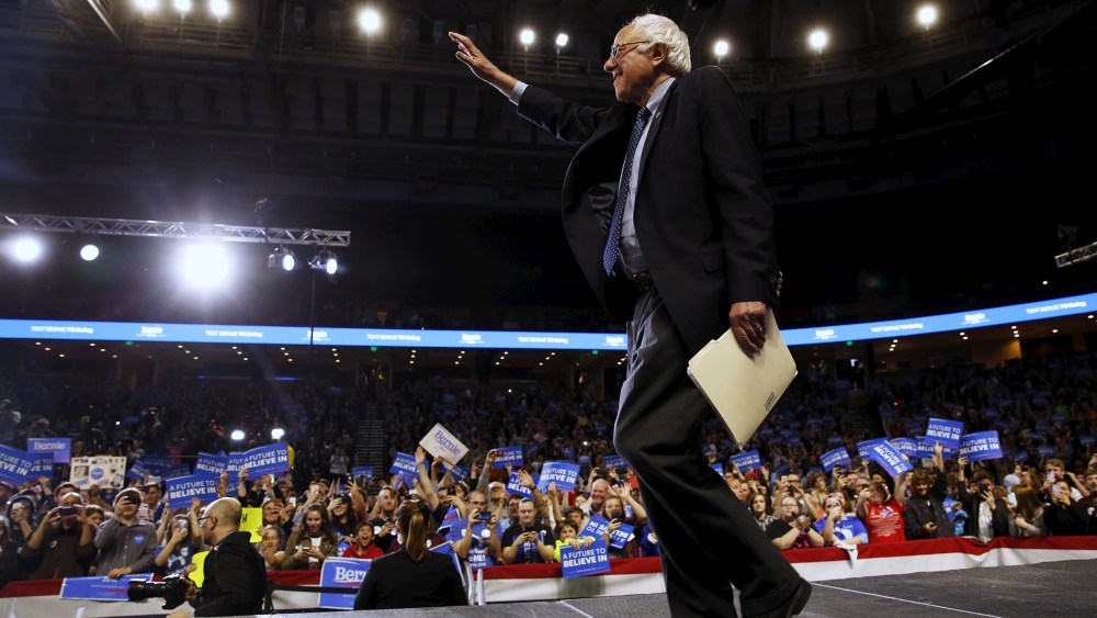 Democratic presidential candidate Bernie Sanders takes the stage to deliver remarks to supporters at an arena in Greenville, S.C., Feb. 21, 2016. (Photo by Jonathan Ernst/Reuters)