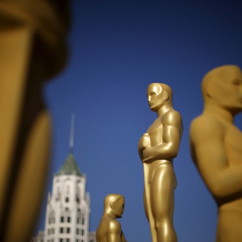Oscar statues are painted outside the entrance to the Dolby Theatre as preparations continue for the 88th Academy Awards in Hollywood, Calif., Feb. 25, 2016. (Photo by Lucy Nicholson/Reuters)