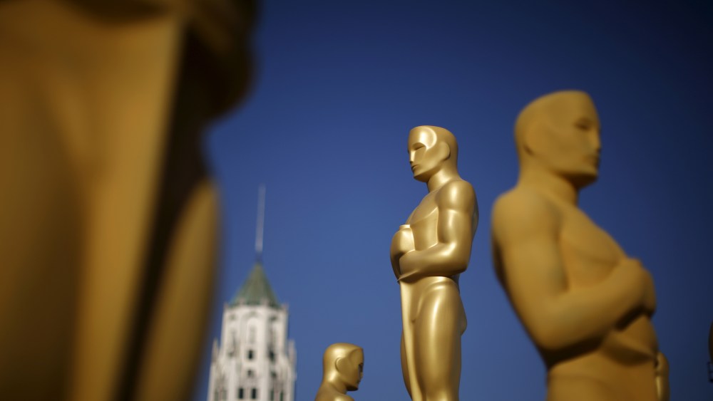 Oscar statues are painted outside the entrance to the Dolby Theatre as preparations continue for the 88th Academy Awards in Hollywood, Calif., Feb. 25, 2016. (Photo by Lucy Nicholson/Reuters)