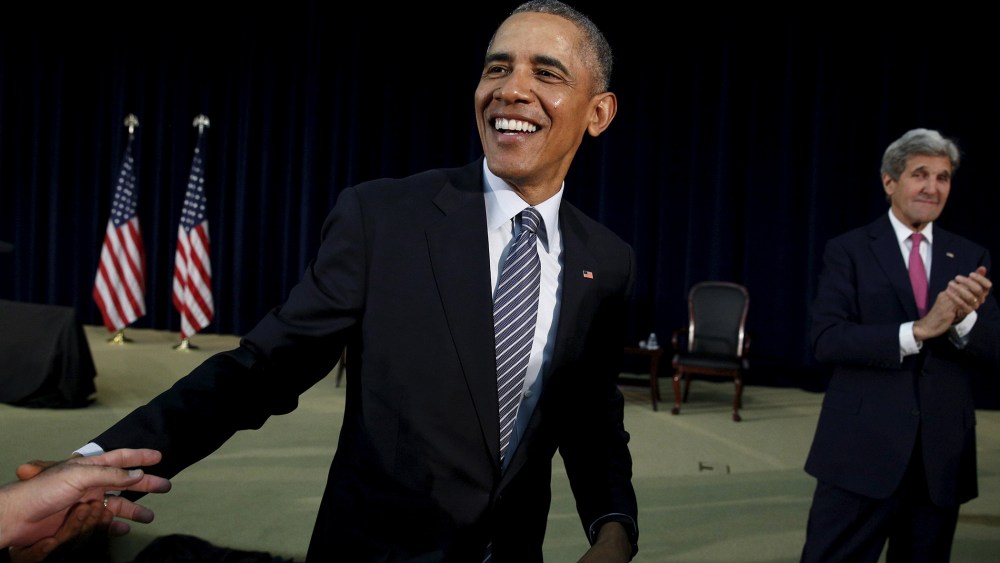 President Barack Obama smiles while greeting members of the audience after speaking at the Chief of Missions Conference at the State Department in Washington, March 14, 2016. (Photo by Kevin Lamarque/Reuters)
