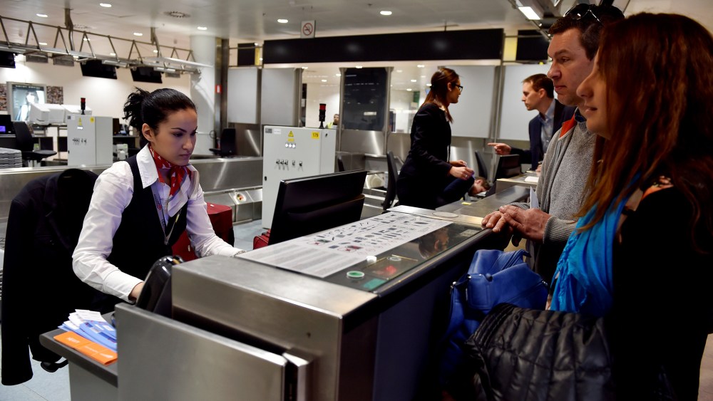 Travelers check in in the departure hall after a ceremony at Brussels Airport as it reopens 40 days after deadly attacks in Zaventem, Belgium, May 1, 2016. (Photo by Eric Vida/Reuters)