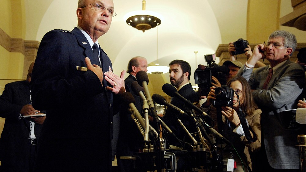 Hayden speaks as he departs a closed-door session with the House Select Committee on Intelligence at the Capitol in Washington