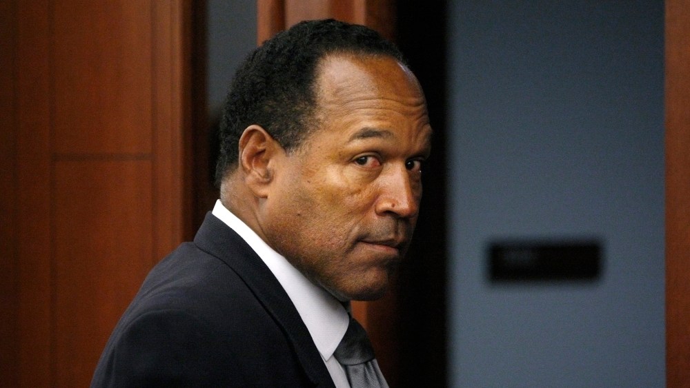 O.J. Simpson leaves the courtroom in Las Vegas, Nev., Sep. 22, 2008. Simpson faces 12 charges, including felony kidnapping, armed robbery and conspiracy. (Photo by John Locher/Reuters)