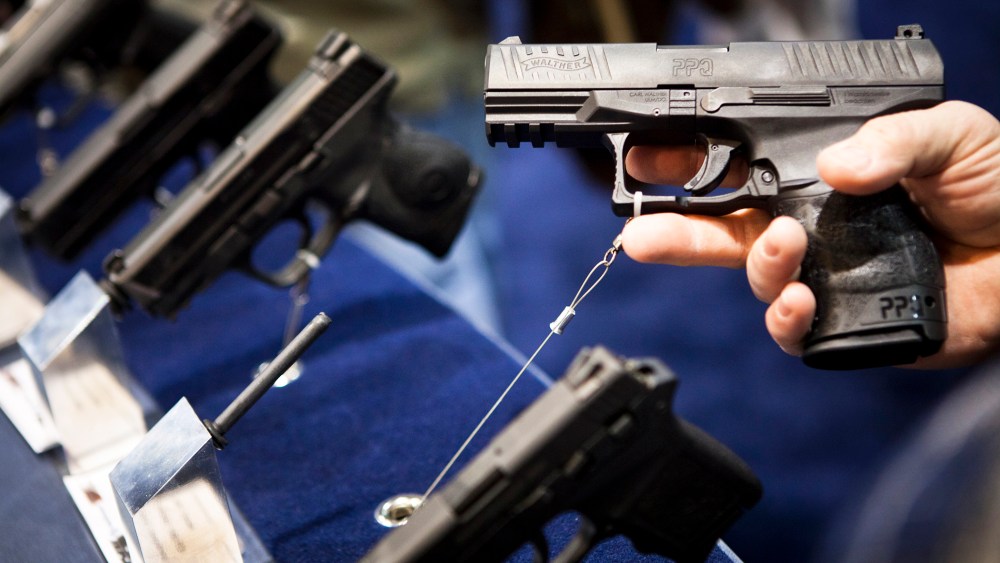 A handgun is displayed during a convention in Reno, Nevada on Jan. 29, 2011. (Photo by Max Whittaker/Reuters)
