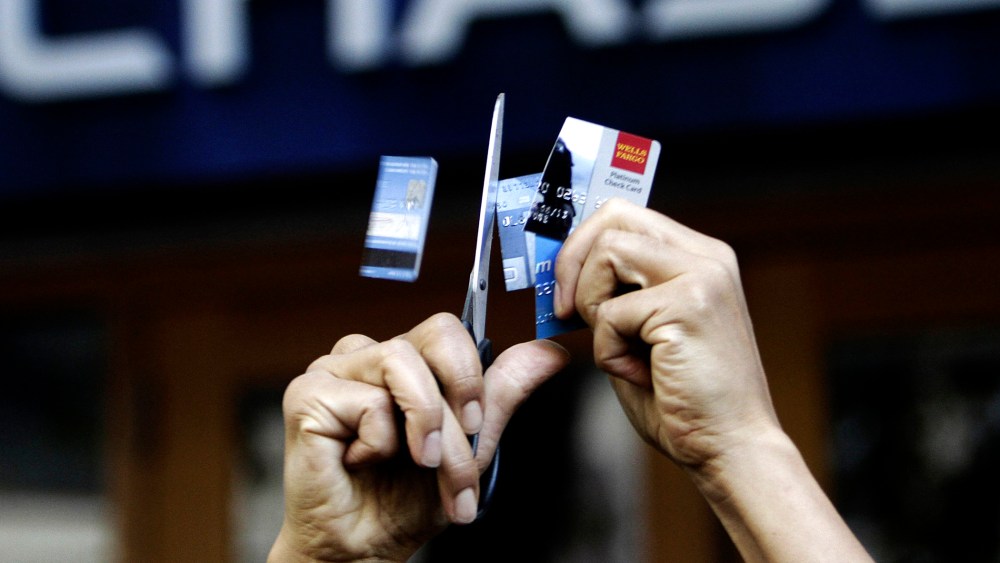 Occupy Seattle protesters cut up bank cards in from of a Chase bank in downtown Seattle, October 15, 2011.