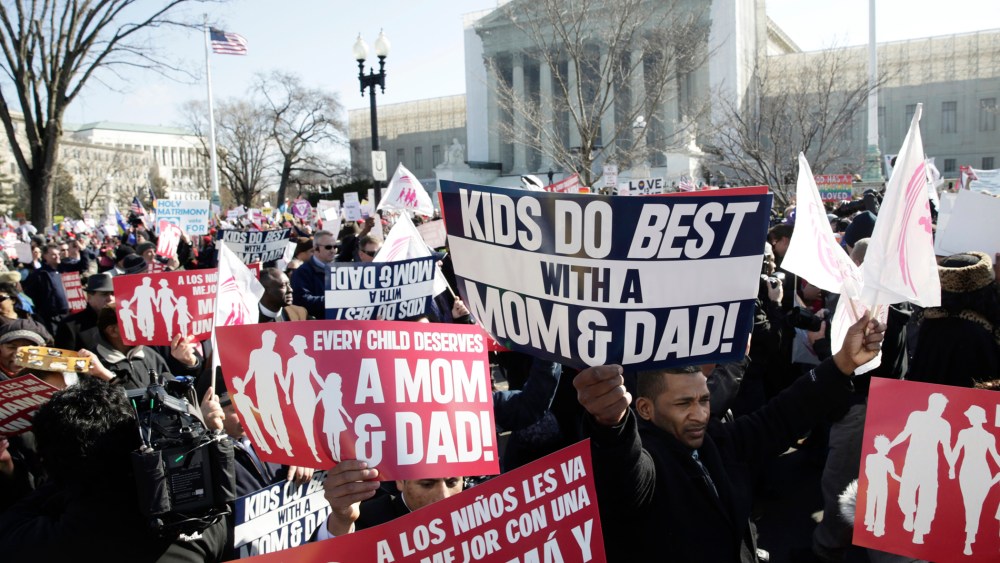 Opponents of same-sex marriage marriage demonstrate in front of the Supreme Court in Washington on March 26, 2013. (Photo by Joshua Roberts/Reuters)