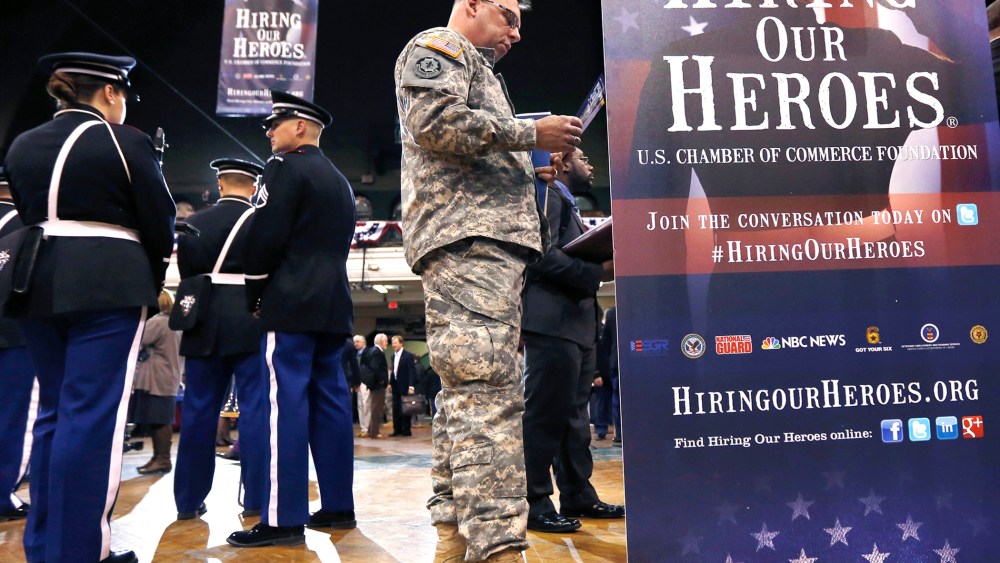 Current and former members of the military attend the 'Hiring Our Heroes' job fair in New York, March 27, 2013.