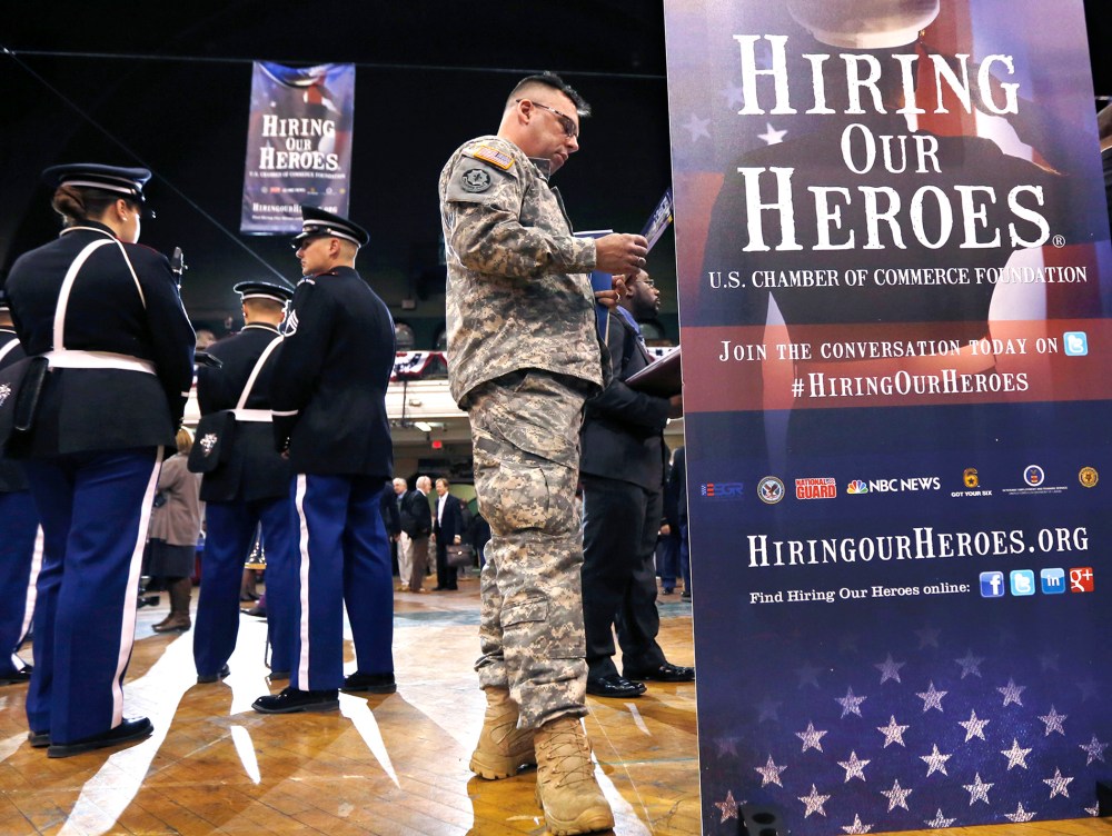 Current and former members of the military attend the 'Hiring Our Heroes' job fair in New York, March 27, 2013.