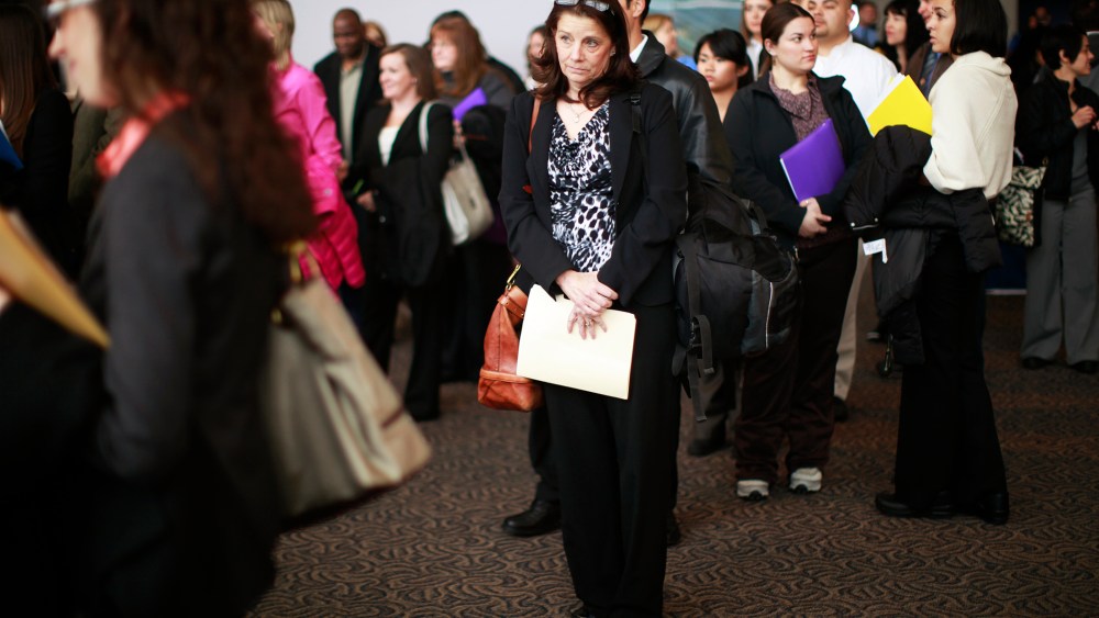 Job seekers listen to a presentation at the Colorado Hospital Association health care career fair in Denver April 9, 2013.