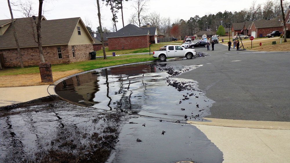Spilt oil from Exxon pipeline run through North Woods Subdivision in Mayflower, Arkansas, March 29, 2013.