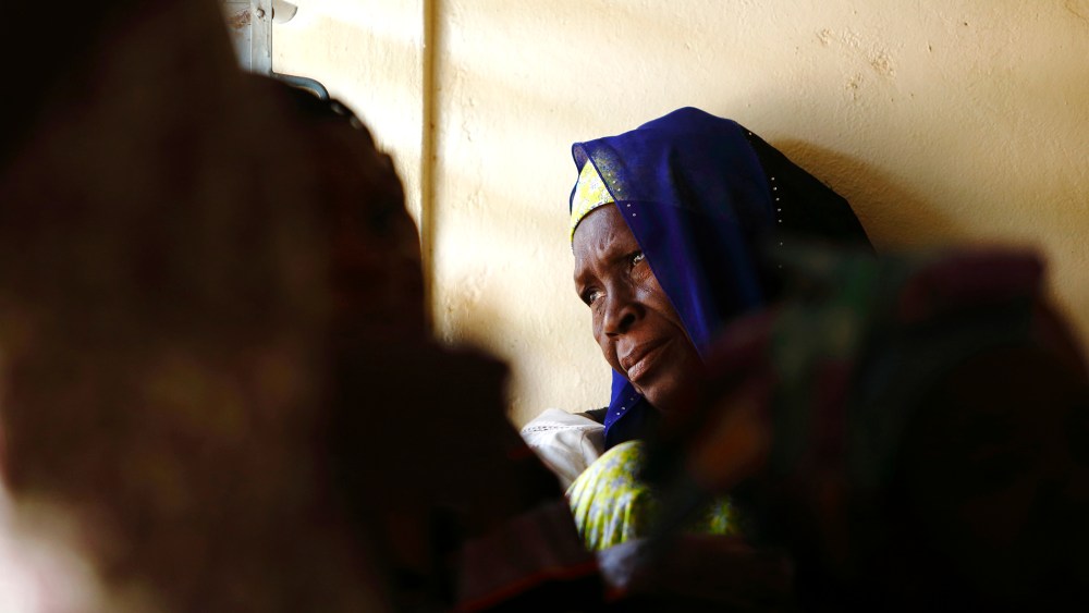 A woman attends a talk on sexual health and HIV prevention in Ouagadougou, Burkina Faso on April 13, 2013.