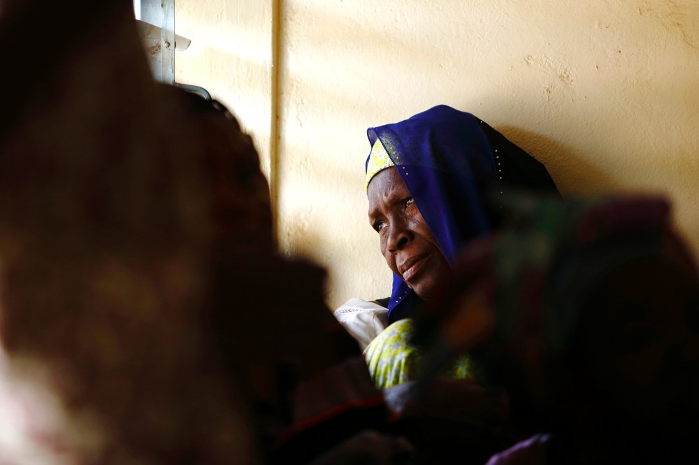 A woman attends a talk on sexual health and HIV prevention in Ouagadougou, Burkina Faso on April 13, 2013.