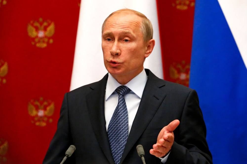 Russian President Vladimir Putin speaks at a joint news conference in Moscow, May 7, 2014.