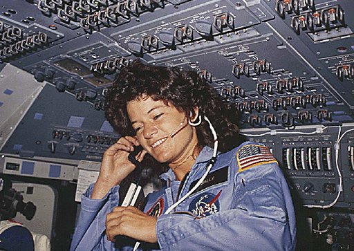 (FILE) This NASA file photo dated June 1983 shows America's first woman astronaut Sally Ride, as she communicates with ground controllers from the flight deck during the six-day space mission of the Challenger. (AFP PHOTO/NASA)