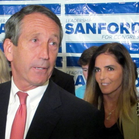 Sanford with his fiancee Maria Belen Chapur (AP Photo/Bruce Smith)