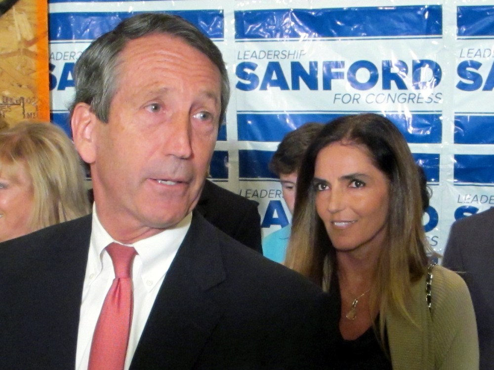 Sanford with his fiancee Maria Belen Chapur (AP Photo/Bruce Smith)