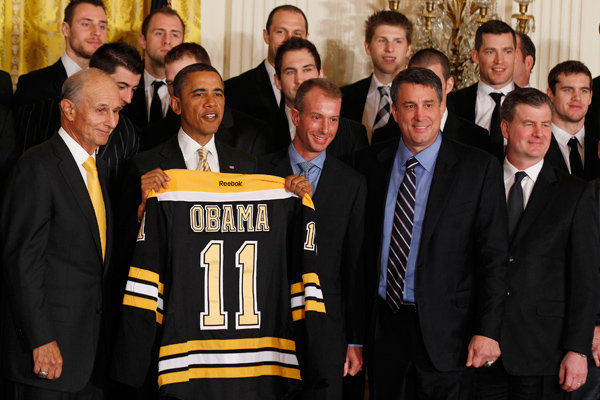 President Obama posing with the Boston Bruins at the White House on Monday.