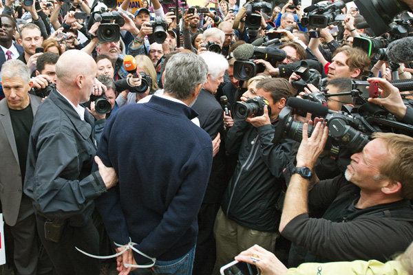 George Clooney and his father Nick Clooney getting arrested outside Sudanese Embassy in Washington, D.C. on Friday.