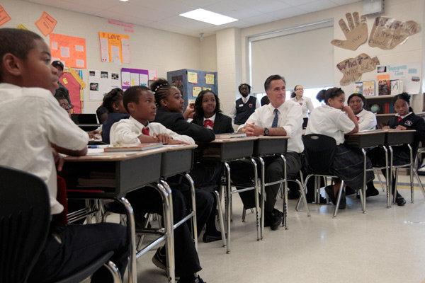 Mitt Romney taking part in the 6th grade language arts class during a tour of the Universal Bluford Charter School in Philadelphia on Thursday.
