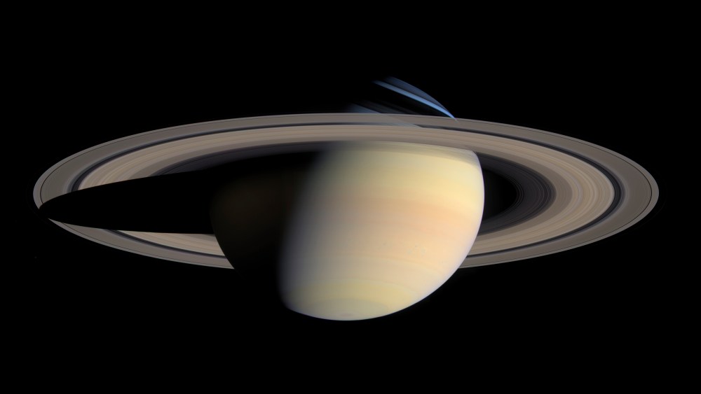 This Oct. 6, 2004 photo provided by NASA, taken by the Cassini Saturn Probe, shows the planet Saturn and its rings. One of the most evocative mysteries of the solar system, where Saturn got its stunning rings, may actually be a case of cosmic murder...