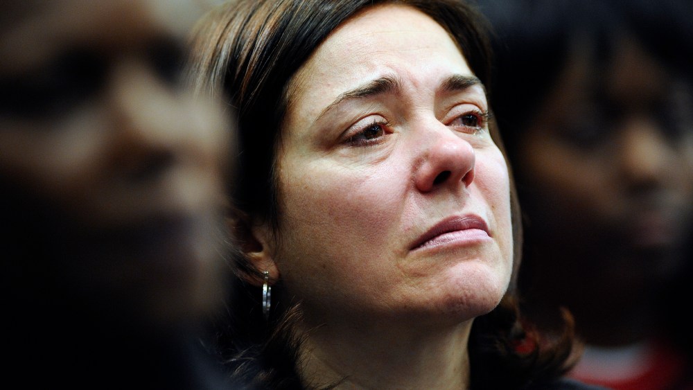 Francine Wheeler, mother of Sandy Hook Elementary School shooting victim Benjamin Wheeler, cries as she listens to Vice President Joe Biden speak during a gun violence conference in Danbury, Conn., Thursday, Feb. 21, 2013. (AP Photo/Jessica Hill)