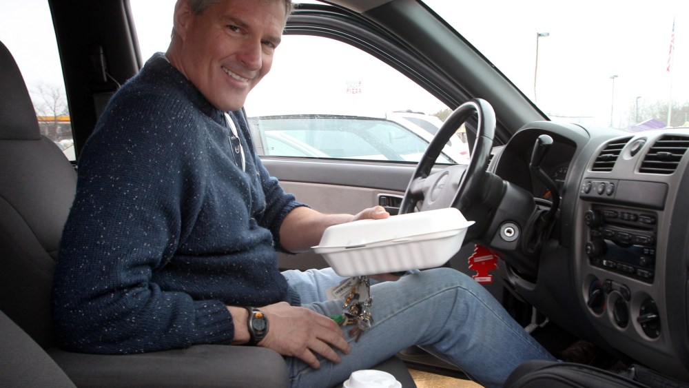 This photo taken March 22, 2014, shows former Massachusetts Sen. Scott Brown in his pick-up truck in Tilton, N.H.