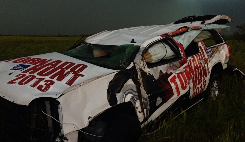 @SeanSchoferTVN: The @weatherchannel vehicle just got thrown by tornado. We stopped to help & they are OK. @jimcantore pic.twitter.com/AayAhvuBwA (Photo: TVNweather.com)