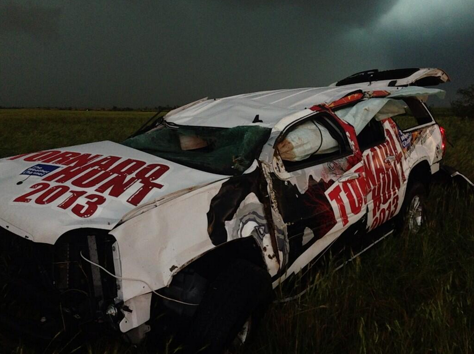 @SeanSchoferTVN: The @weatherchannel vehicle just got thrown by tornado. We stopped to help & they are OK. @jimcantore pic.twitter.com/AayAhvuBwA (Photo: TVNweather.com)