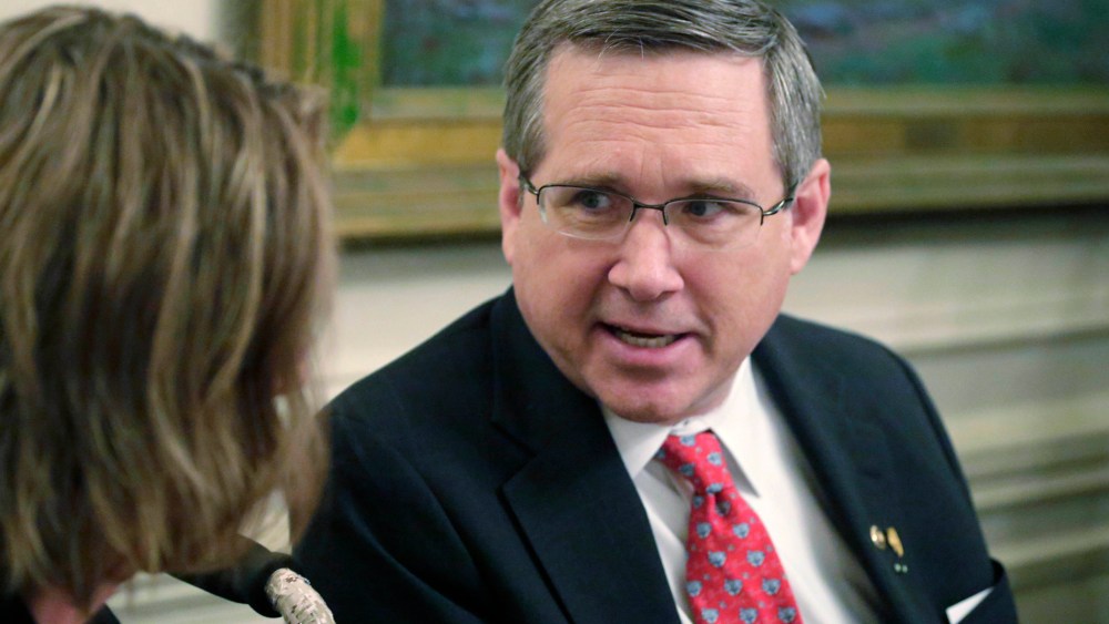 U.S. Sen. Mark Kirk, R-Ill., speaks to Illinois Republican Senate leader Christine Radogno during a Kirk fundraiser, on March 16, 2015, in Chicago.