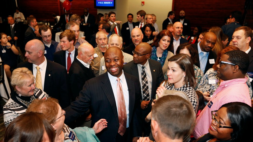 Sen. Tim Scott greets supporters after winning his Senate race over challengers Jill Bossi and Joyce Dickerson on Nov. 4, 2014, in North Charleston, S.C.