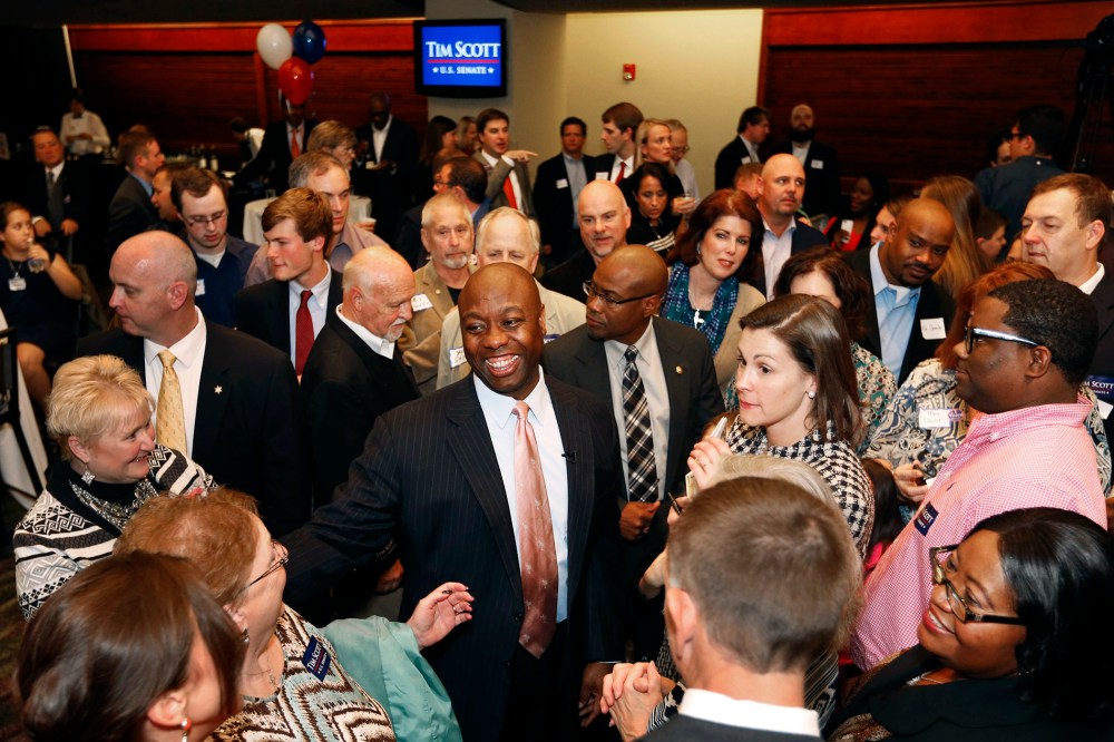 Sen. Tim Scott greets supporters after winning his Senate race over challengers Jill Bossi and Joyce Dickerson on Nov. 4, 2014, in North Charleston, S.C.