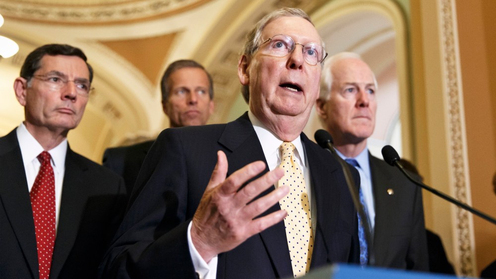 Senate Minority Leader Mitch McConnell speaks to reporters, June 10, 2014.