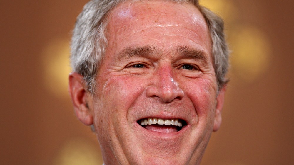 File Photo: US President George W. Bush laughs during a joint press conference with Prime Minister Gordon Brown (not in picture)on June 16, 2008 in London. The pair discussed Iraq, Afghanistan and Coalition troop withdrawal. President Bush will finish...